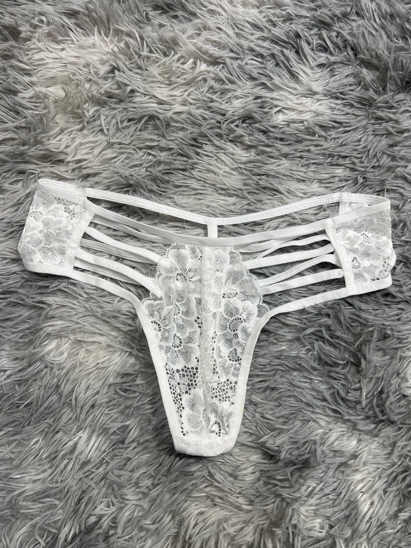 tanga de líneas blanco