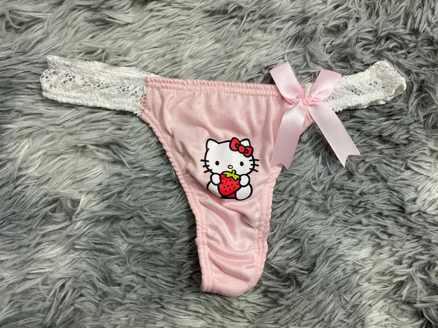 Hello kitty color Rosa Tanga de dama gruesa