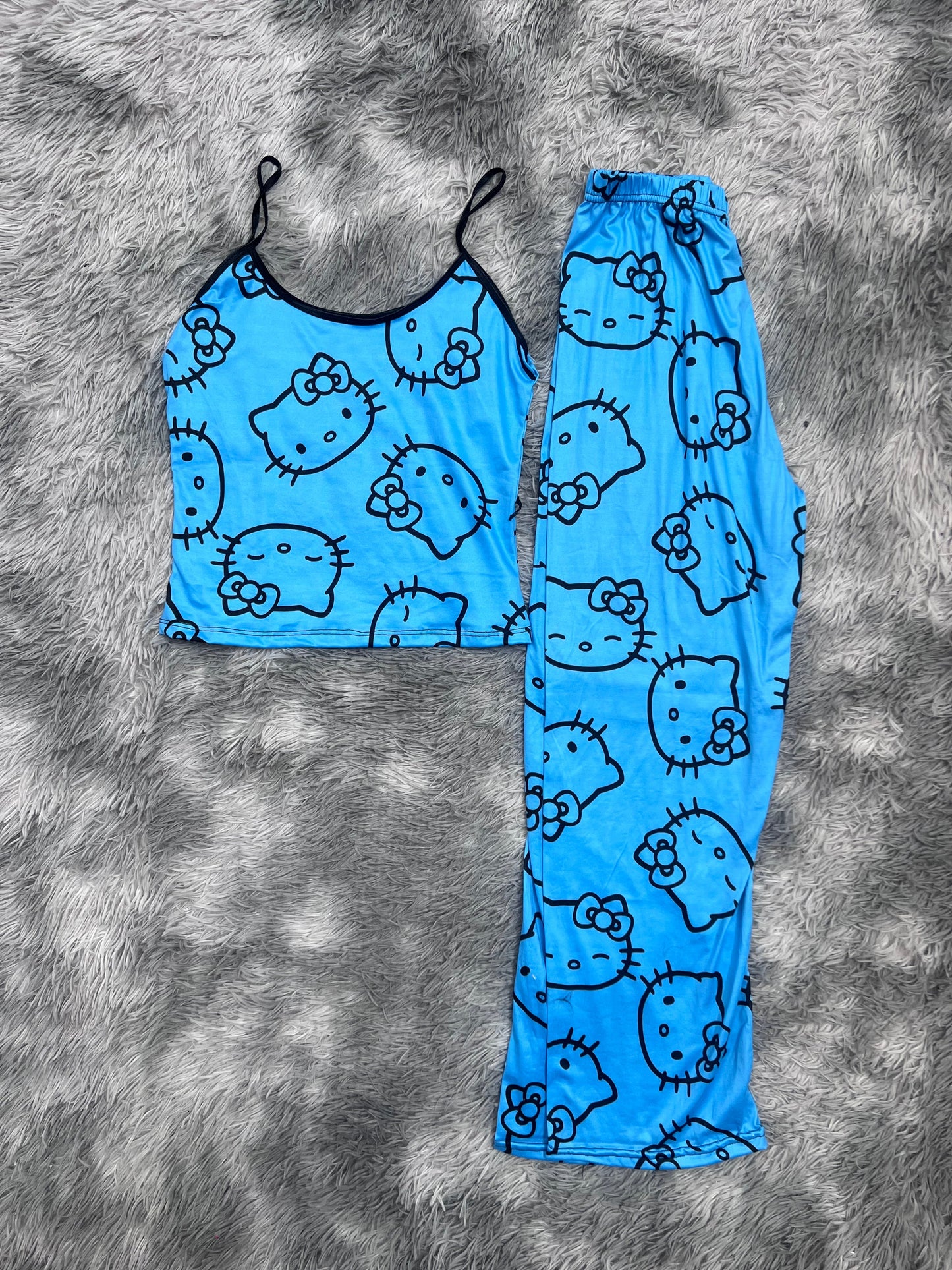 hello kitty fondo azul blusa con pantalón pijama de dama