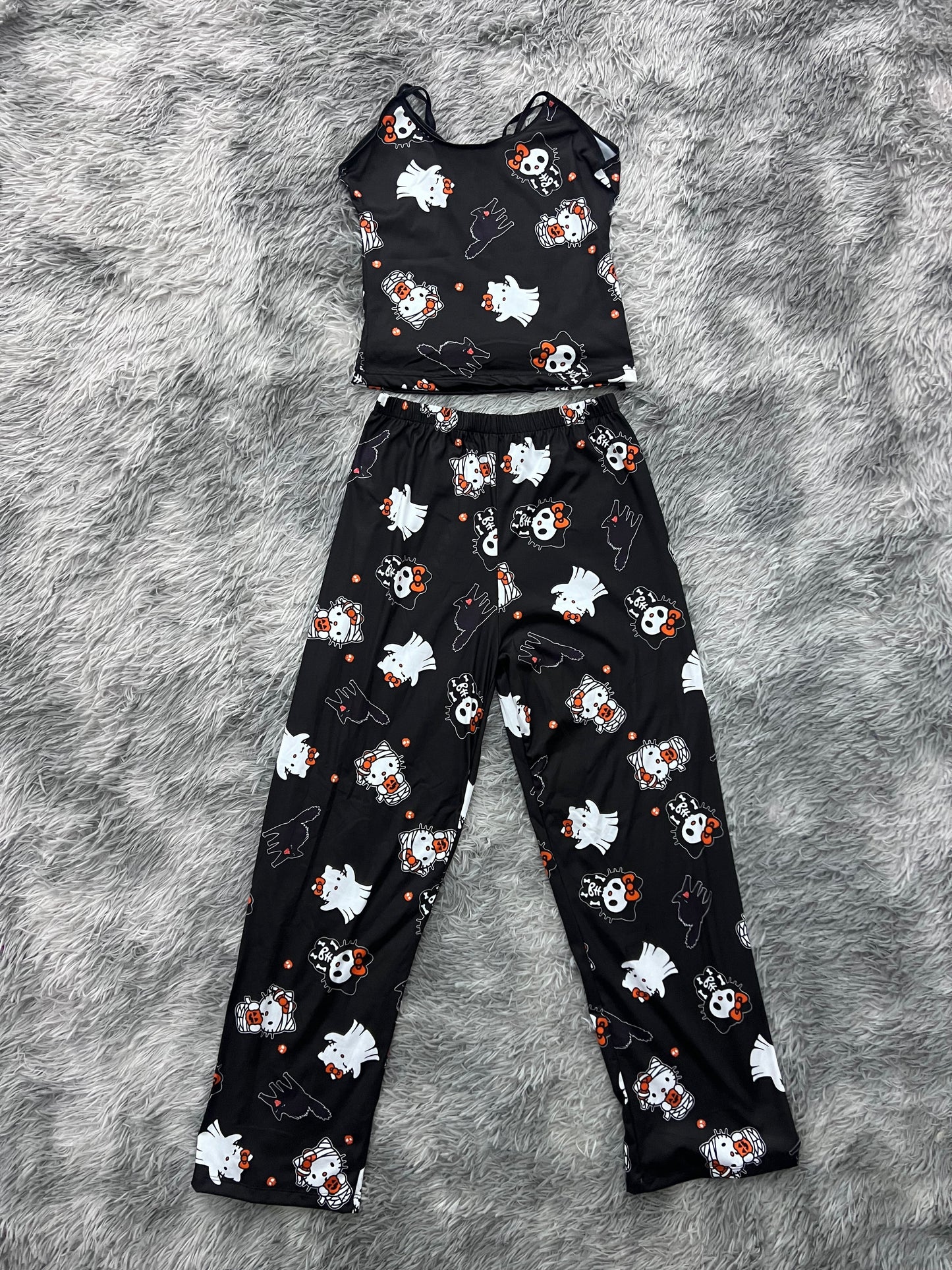 hello kitty momia fondo negro blusa con pantalón pijama de dama