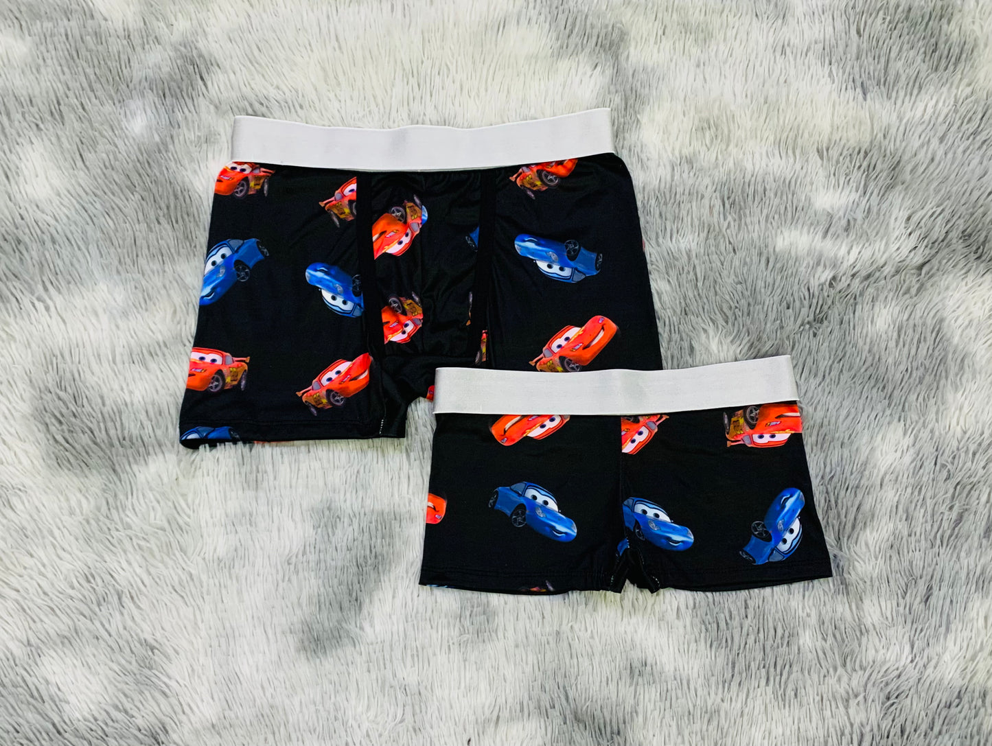 Cars con Salli fondo negro duo boxer