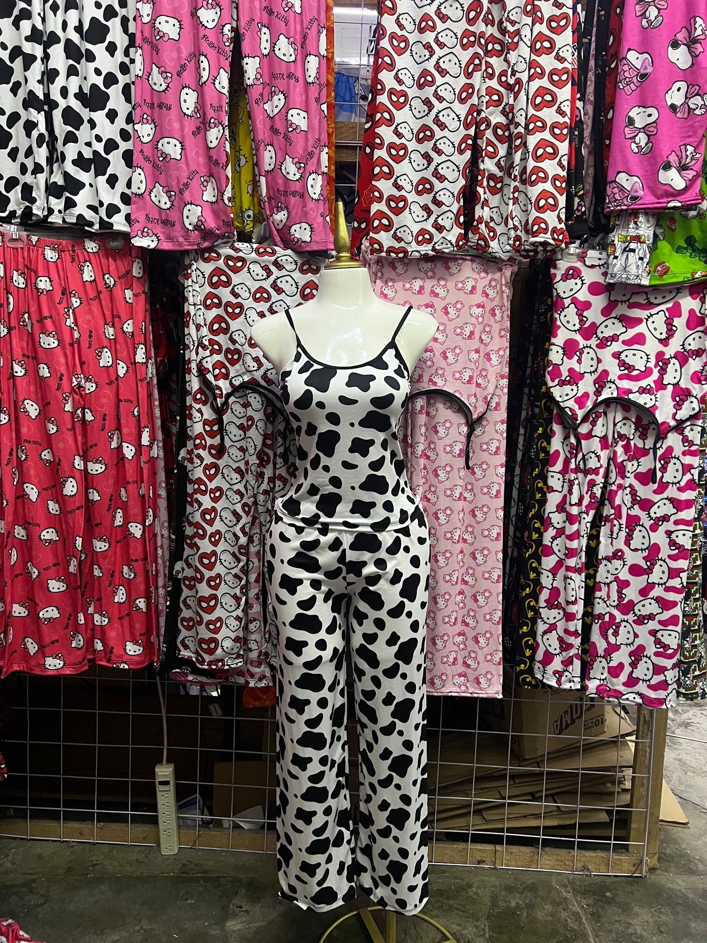 Manchas de vaca Pijama de dama con blusa y pantalón individual de dama