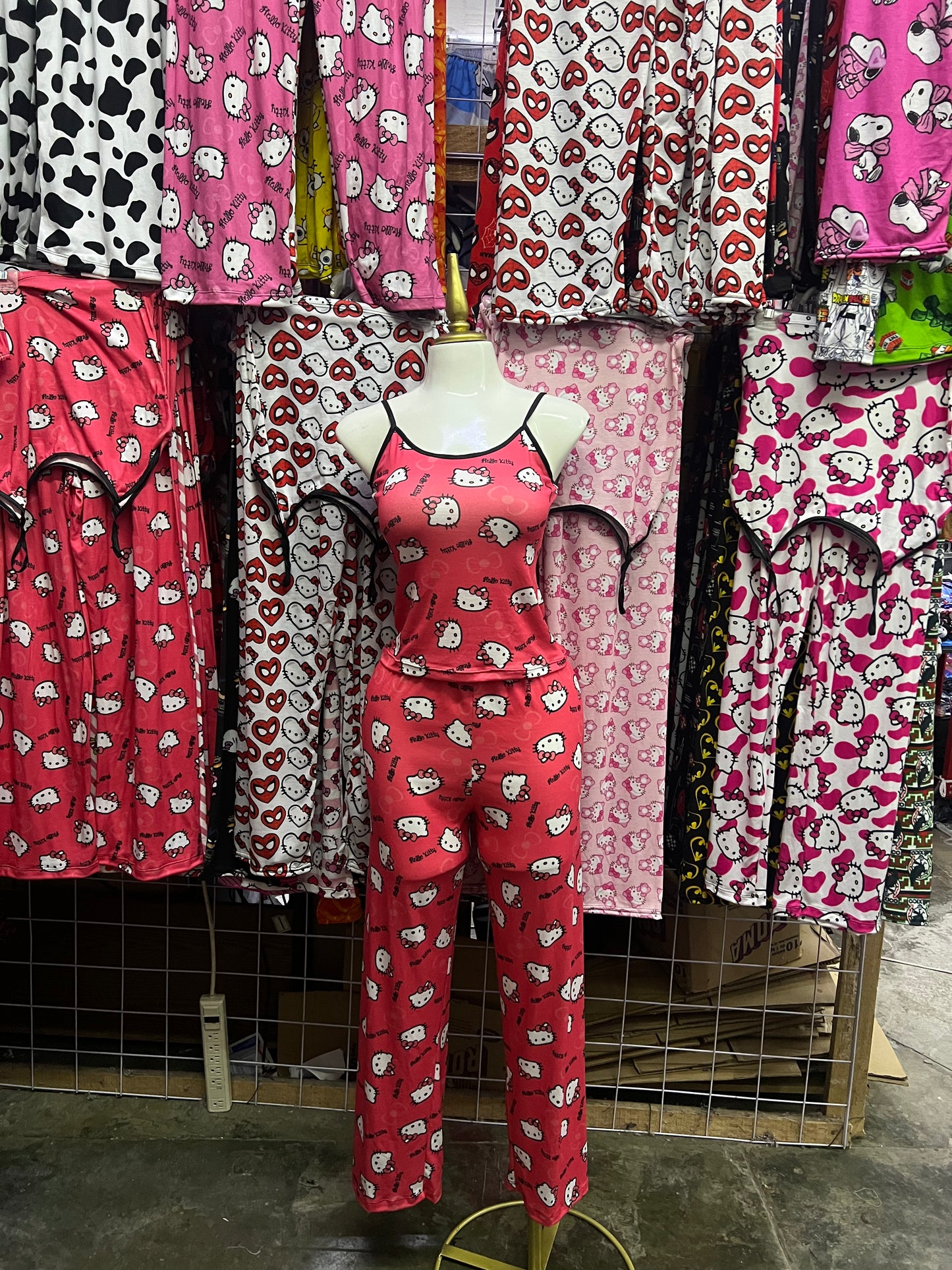Hello kitty moños fondo rosa Pijama de dama con blusa y pantalón individual de dama