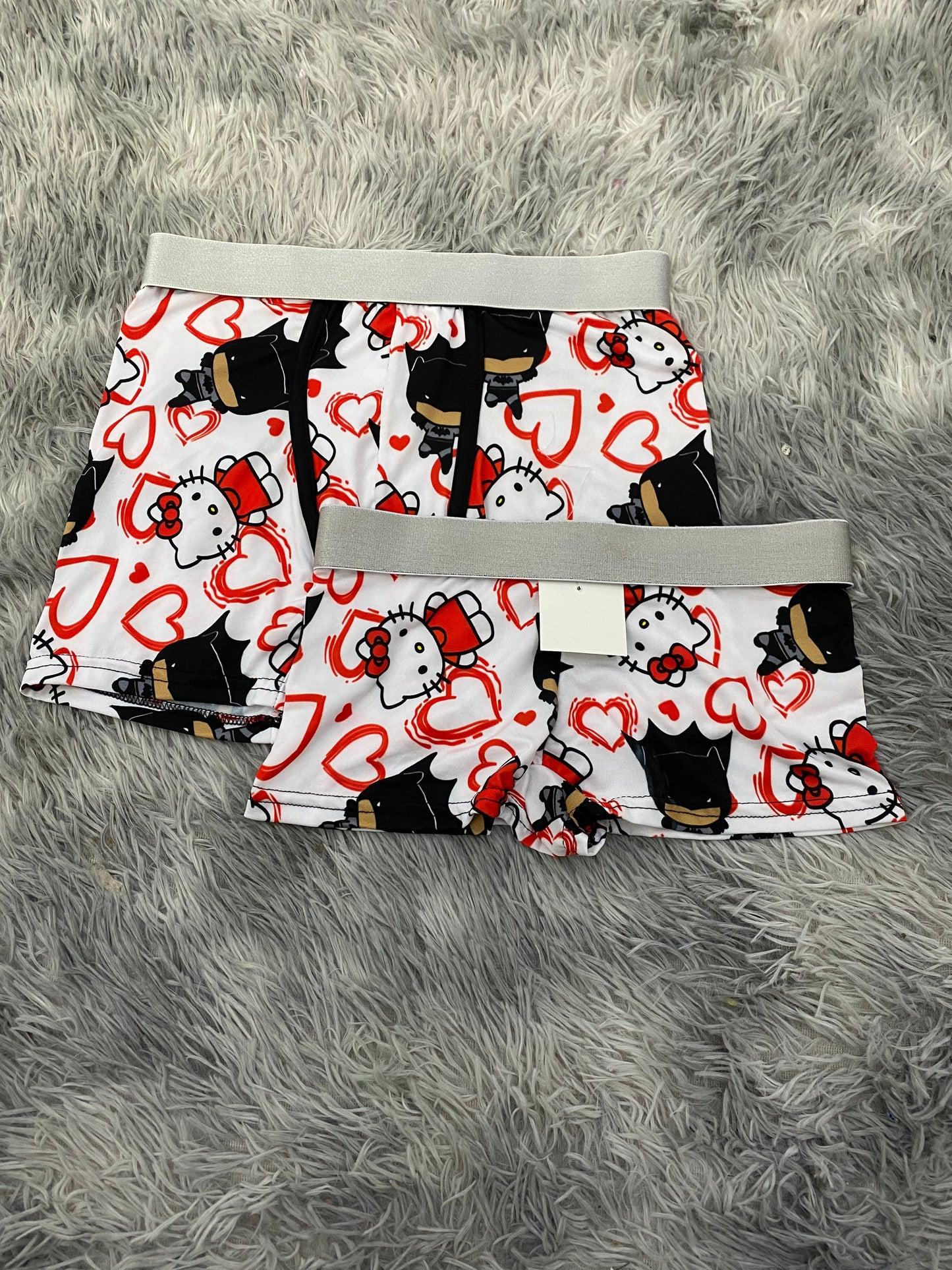 Hello kitty y Batman fondo blanco Duo Con Boxer XL