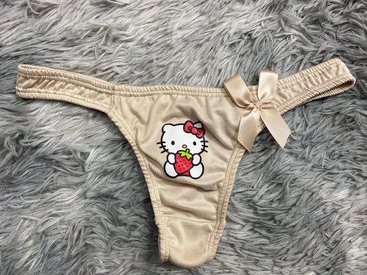 Hello kitty color cafe Tanga de dama gruesa