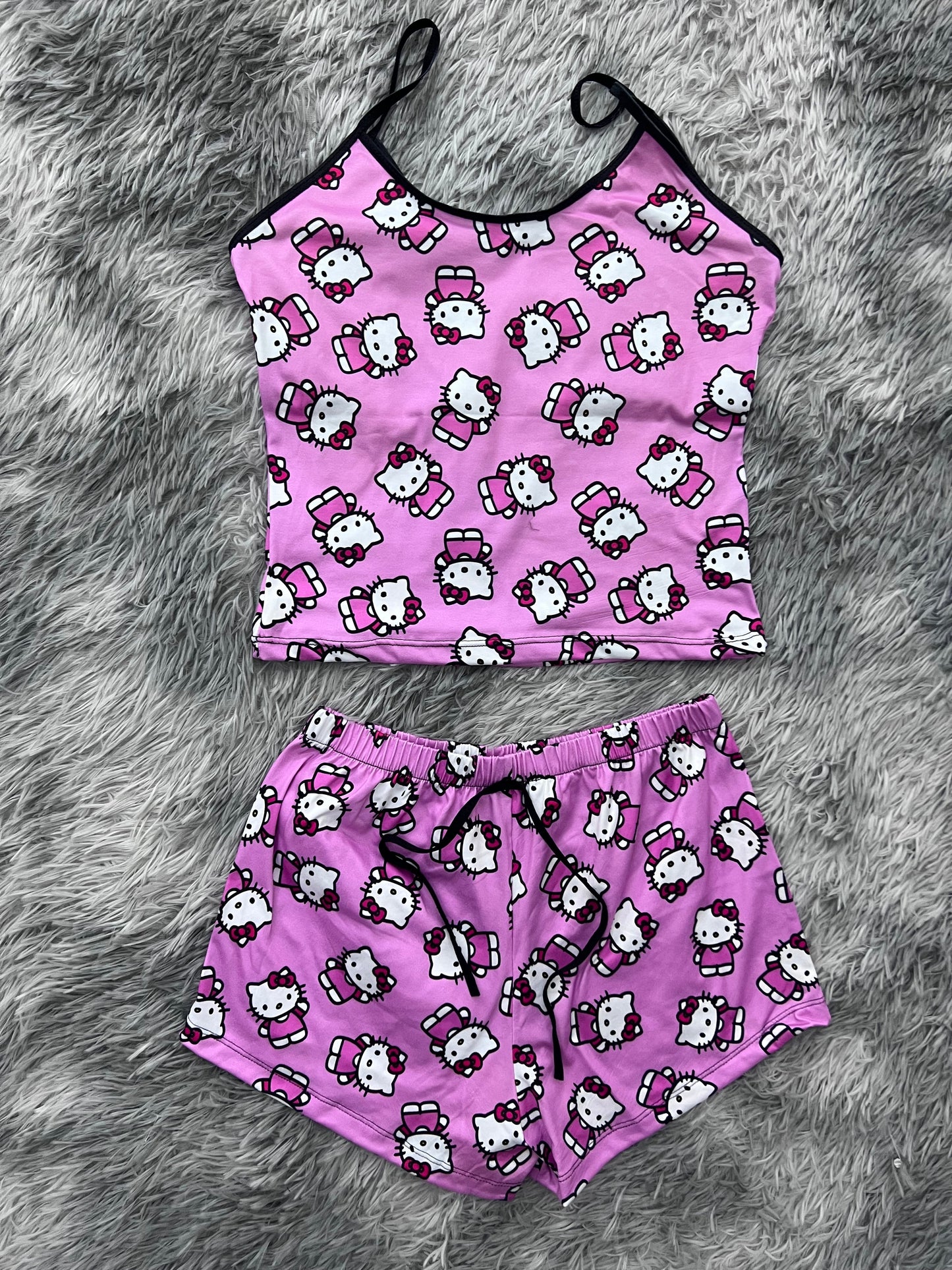 hello kitty saludando blusa con short unitalla de brush