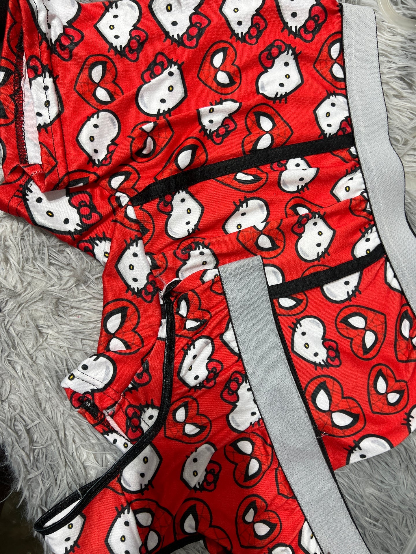 spiderkitty corazones rojos dúo unitalla xl