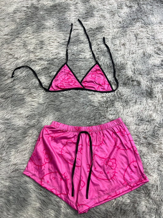 hello kitty rosa grande  Top con short unitalla de brush