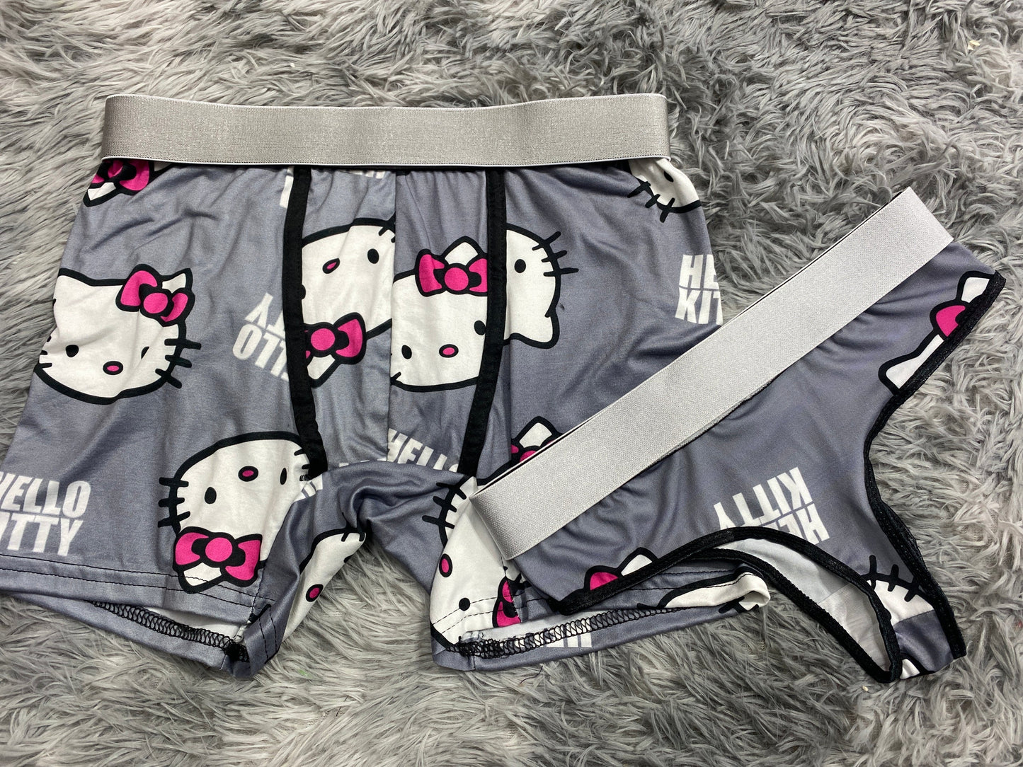 Hello kitty fondo gris duo de tanga unitalla xl