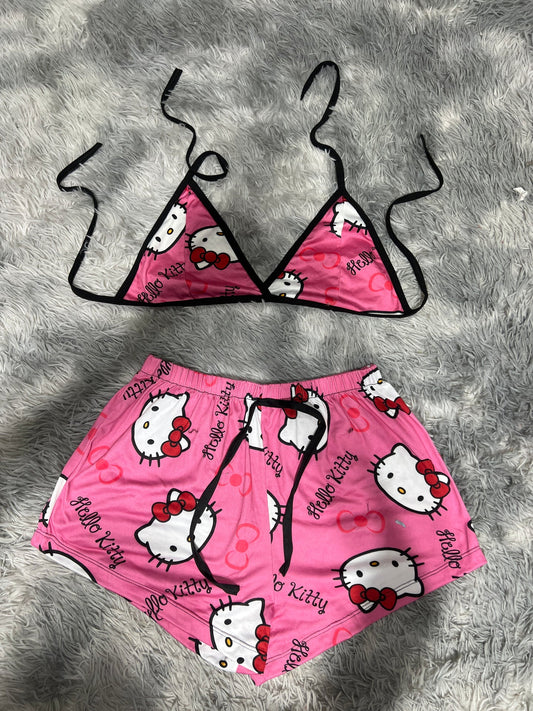hello kitty cara y moños Top con short unitalla de brush