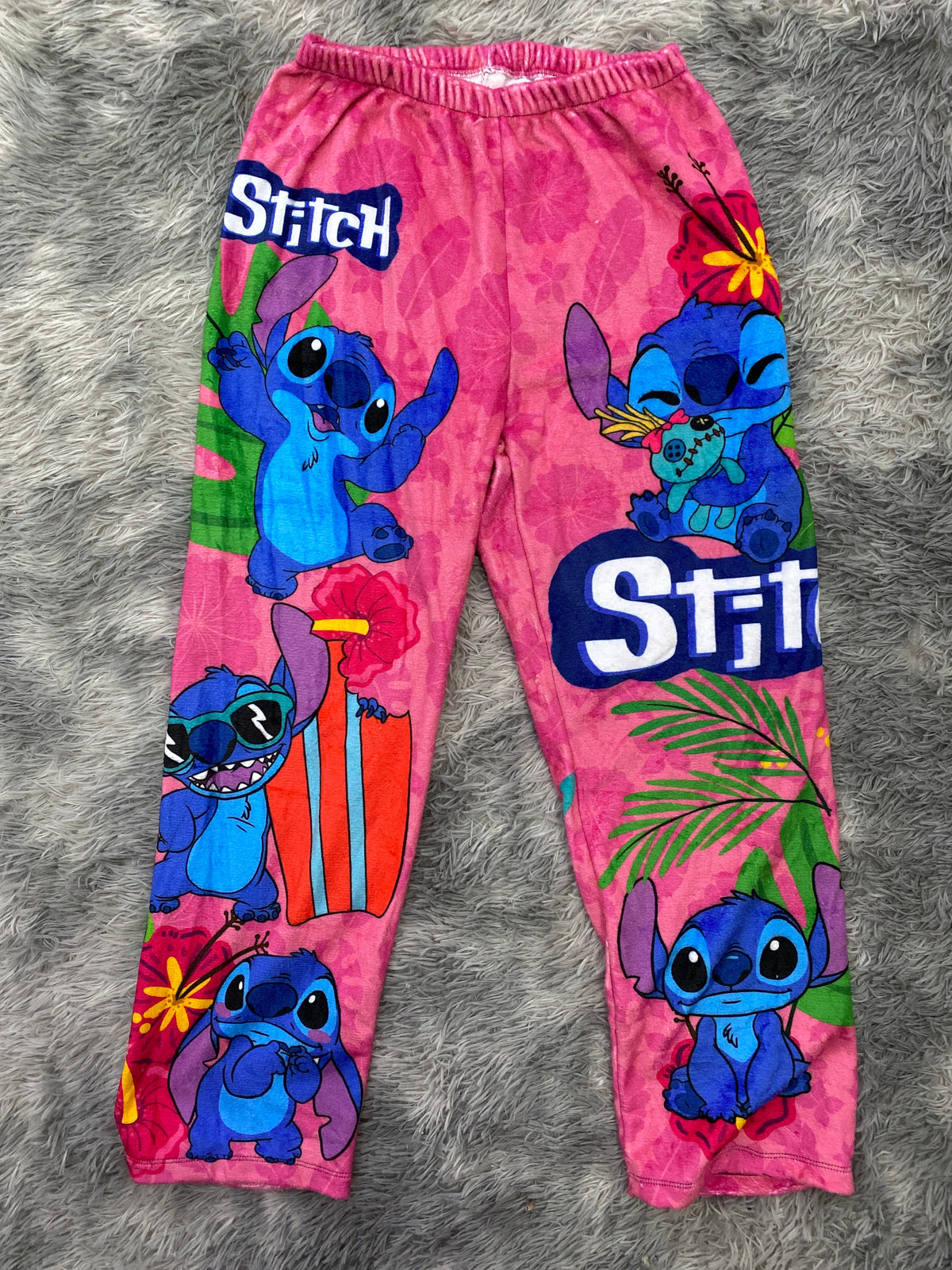 pijama de mujer pantalón afelpado de stitch rosa