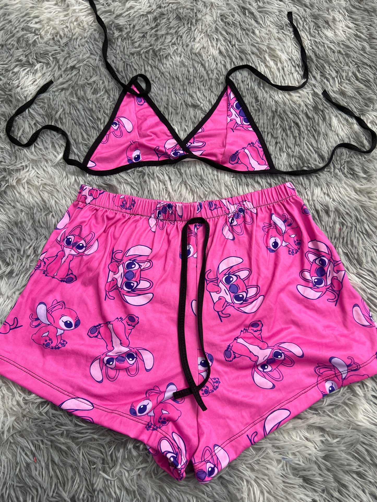 Angel fondo rosa top con short unitalla de brush