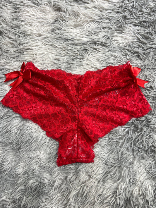 cachetero de moños a los lados rojo