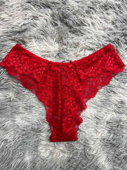 tanga de dama argolla detrás rojo