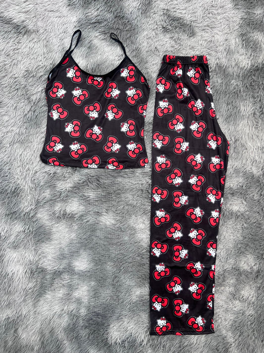 hello kitty moño fondo negro blusa con pantalón pijama de dama