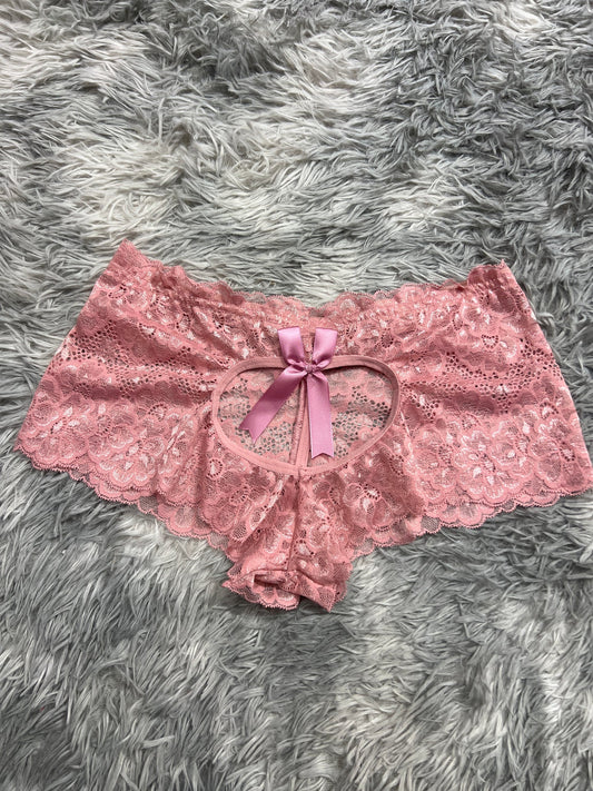cachetero con corazón atrás rosa