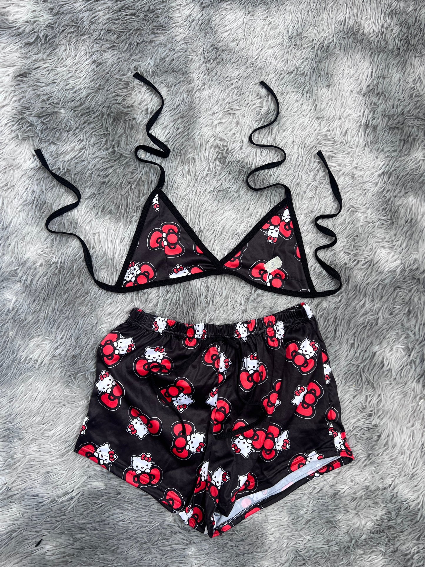 Hello kitty con moño top con short unitalla de brush