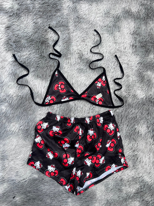 Hello kitty con moño top con short unitalla de brush