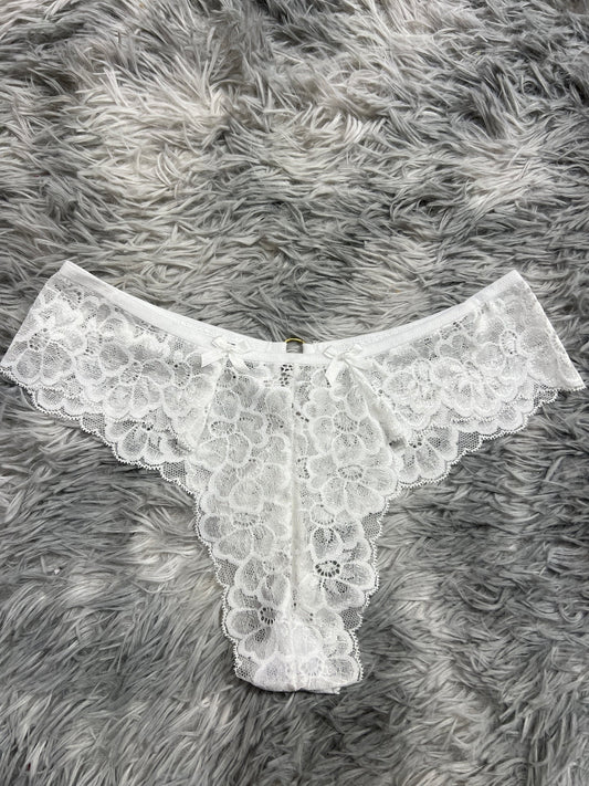 tanga de dama argolla detrás blanco