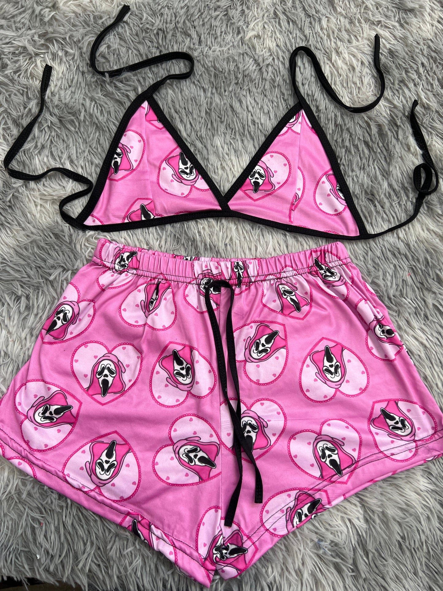 Scream fondo rosa top con short unitalla de brush
