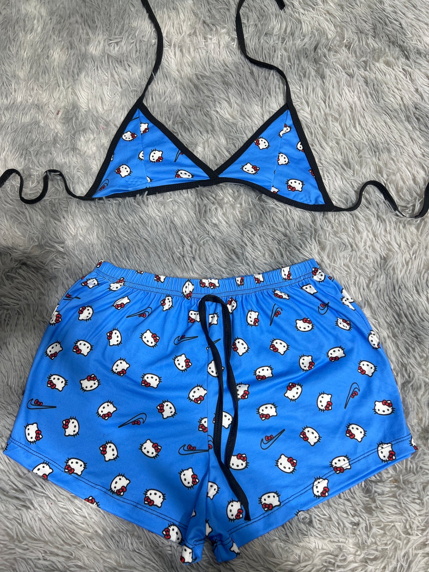 hello kitty nike azul Top con short unitalla de brush