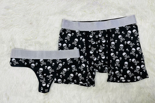 Calaveras fondo negro duo tanga