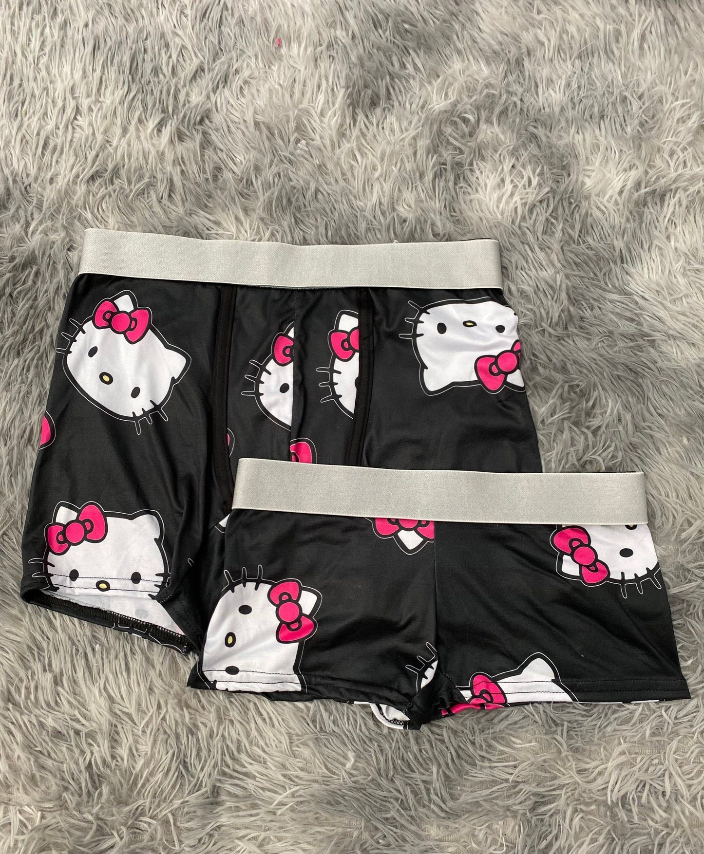Hello kitty caras fondo negro Duo Con Boxer