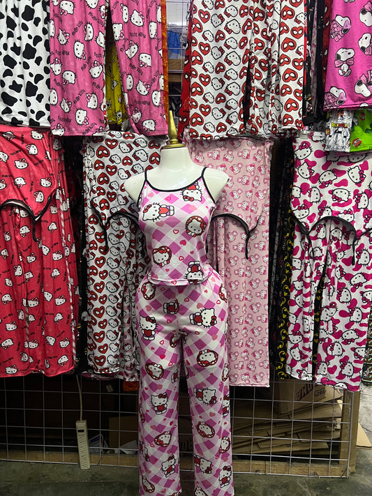 Hello kitty cuadros y corazones rosas Pijama de dama con blusa y pantalón individual de dama