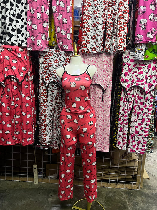 Hello kitty moños fondo rosa Pijama de dama con blusa y pantalón individual de dama