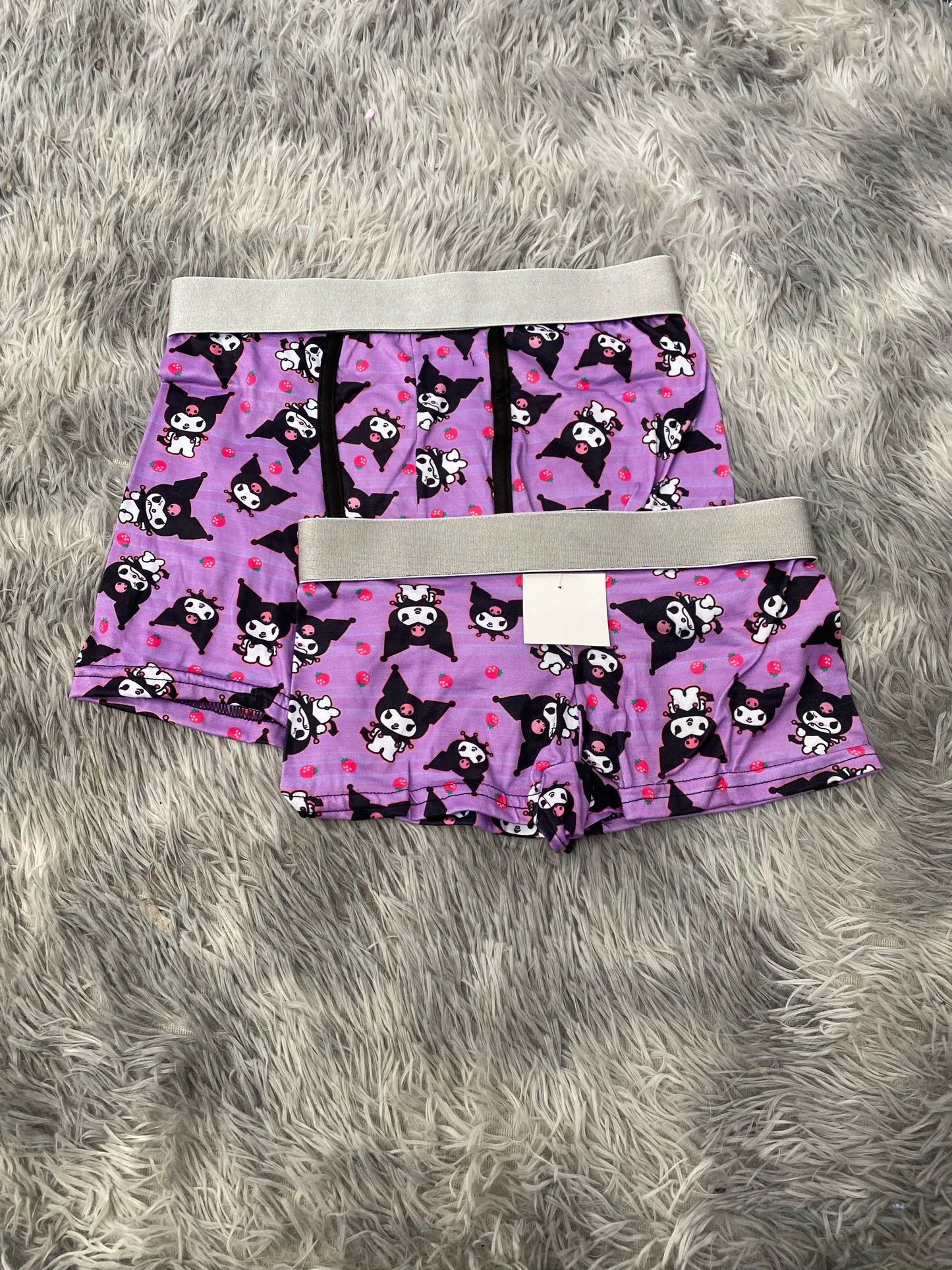 Kuromi enojada fondo morado Duo Con Boxer