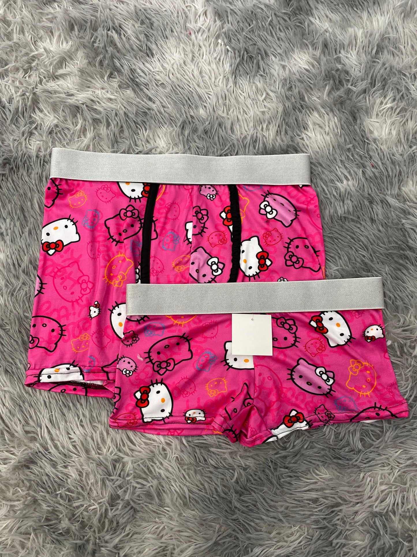 Hello kitty caras colores fondo rosa Duo Con Boxer