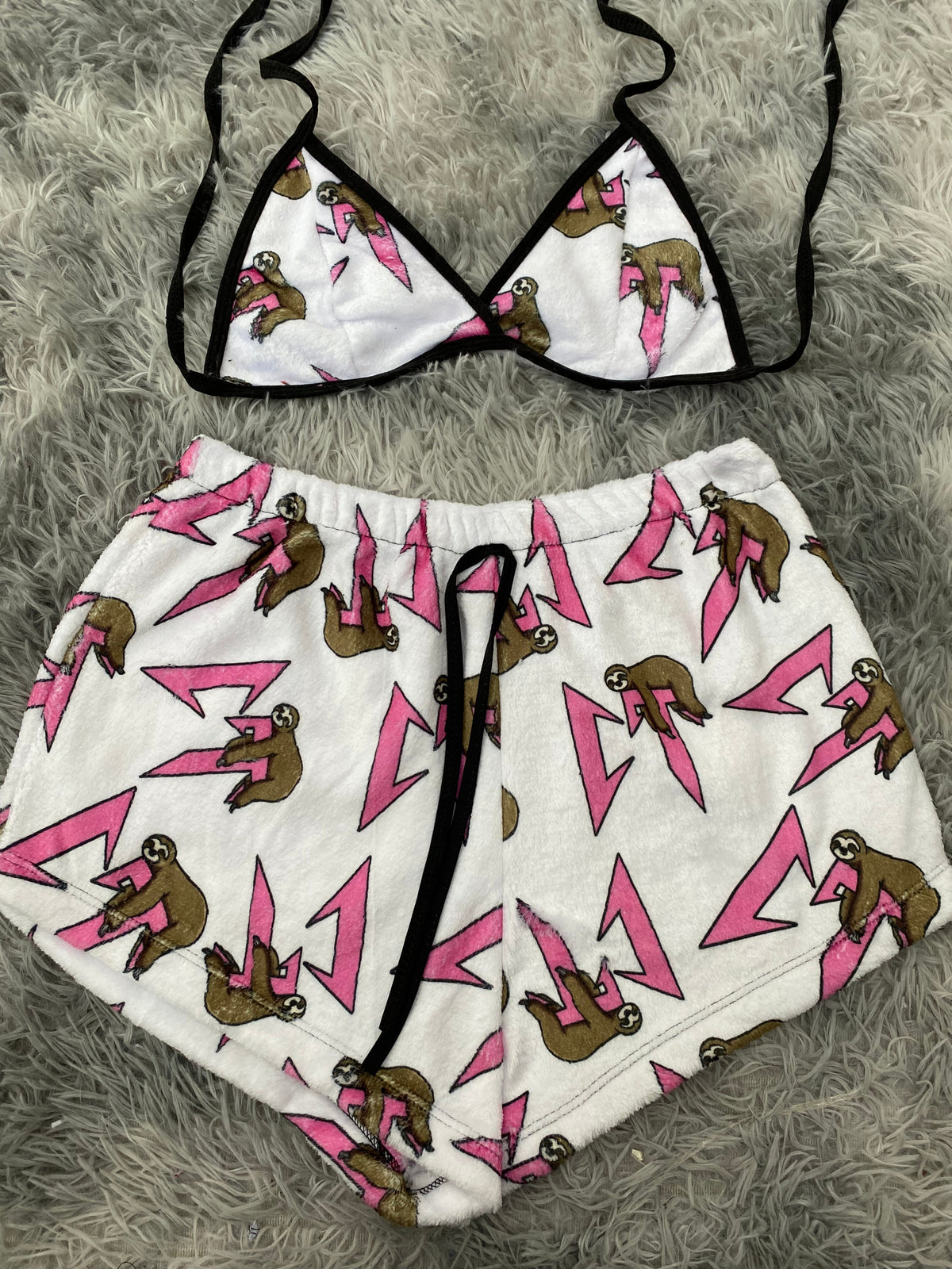 Ct letras rosas fondo blanco top con short unitalla de afelpado