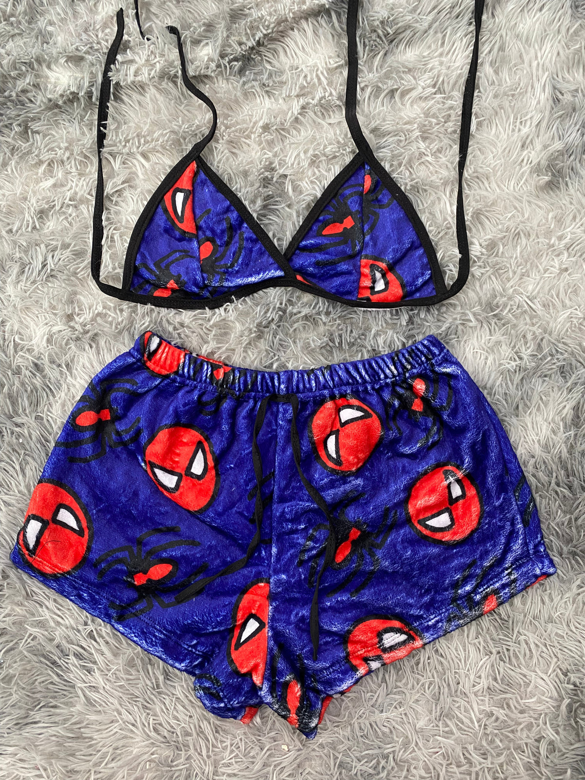 Spiderman fondo azul top con short unitalla de afelpado