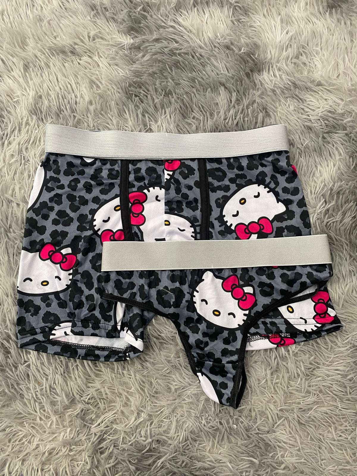 Hello Kitty animal print gris Duo Unitalla Con Tanga