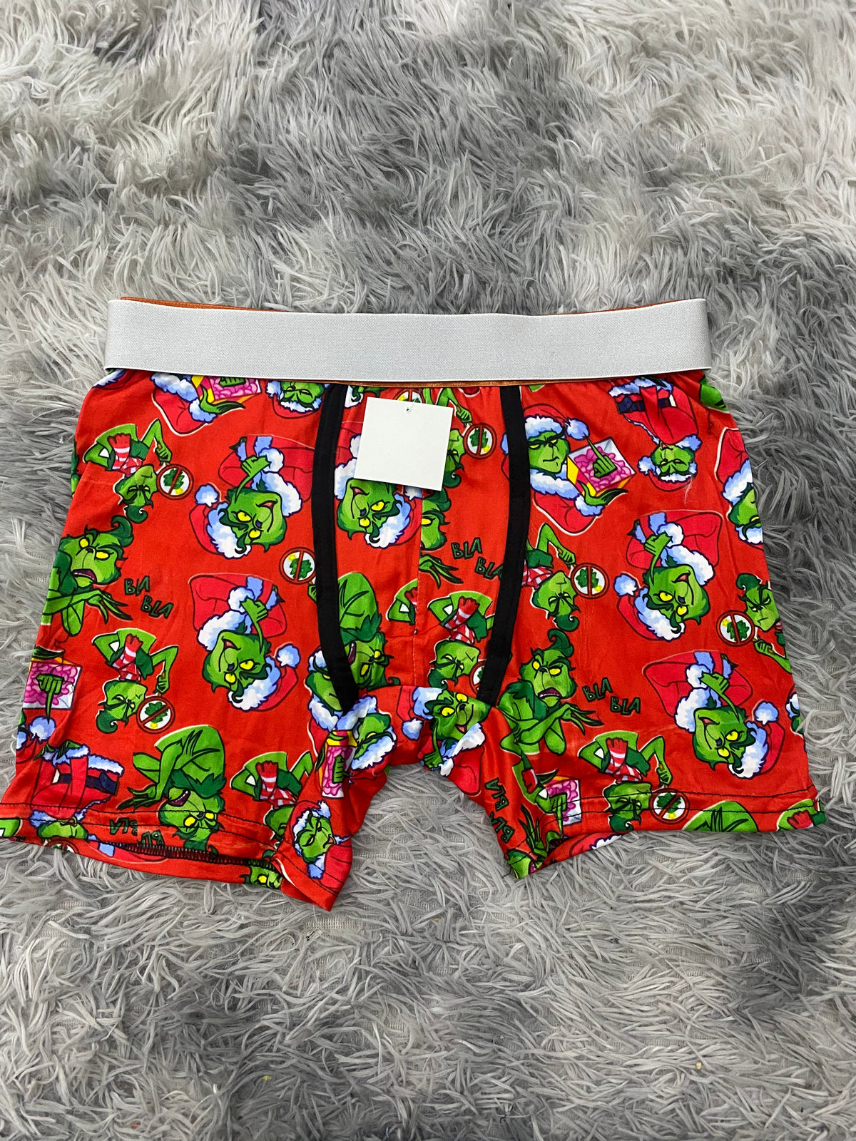 Grinch animado fondo rojo Boxer De Hombre unitalla